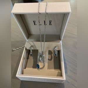 Beautiful brand new never worn Elle necklace and earrings set